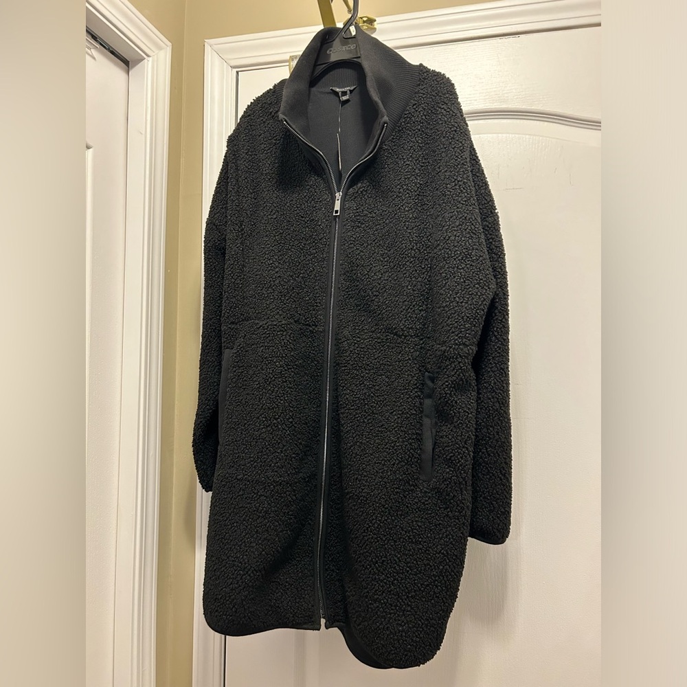 New with tags black Sherpa fleece jacket.